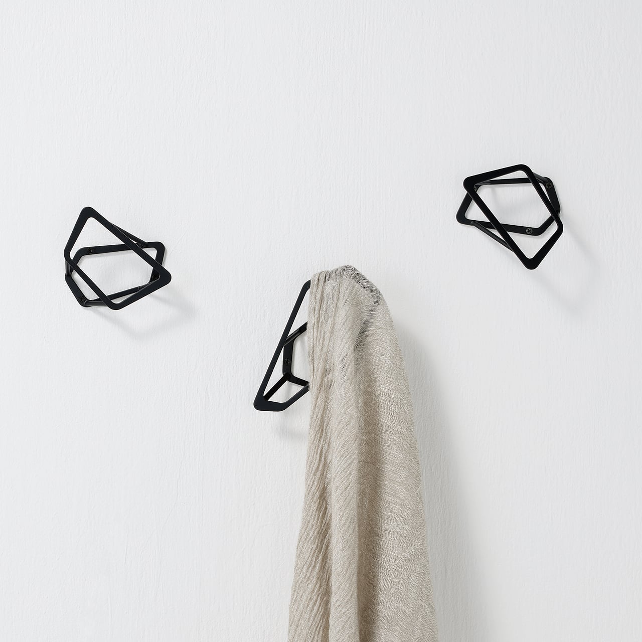 《ブロンズ製のコートフック》アシンメトリーデザインと日の光、照明がつくり出す影が美しい（Mサイズ）splinkle （スプリンクル）